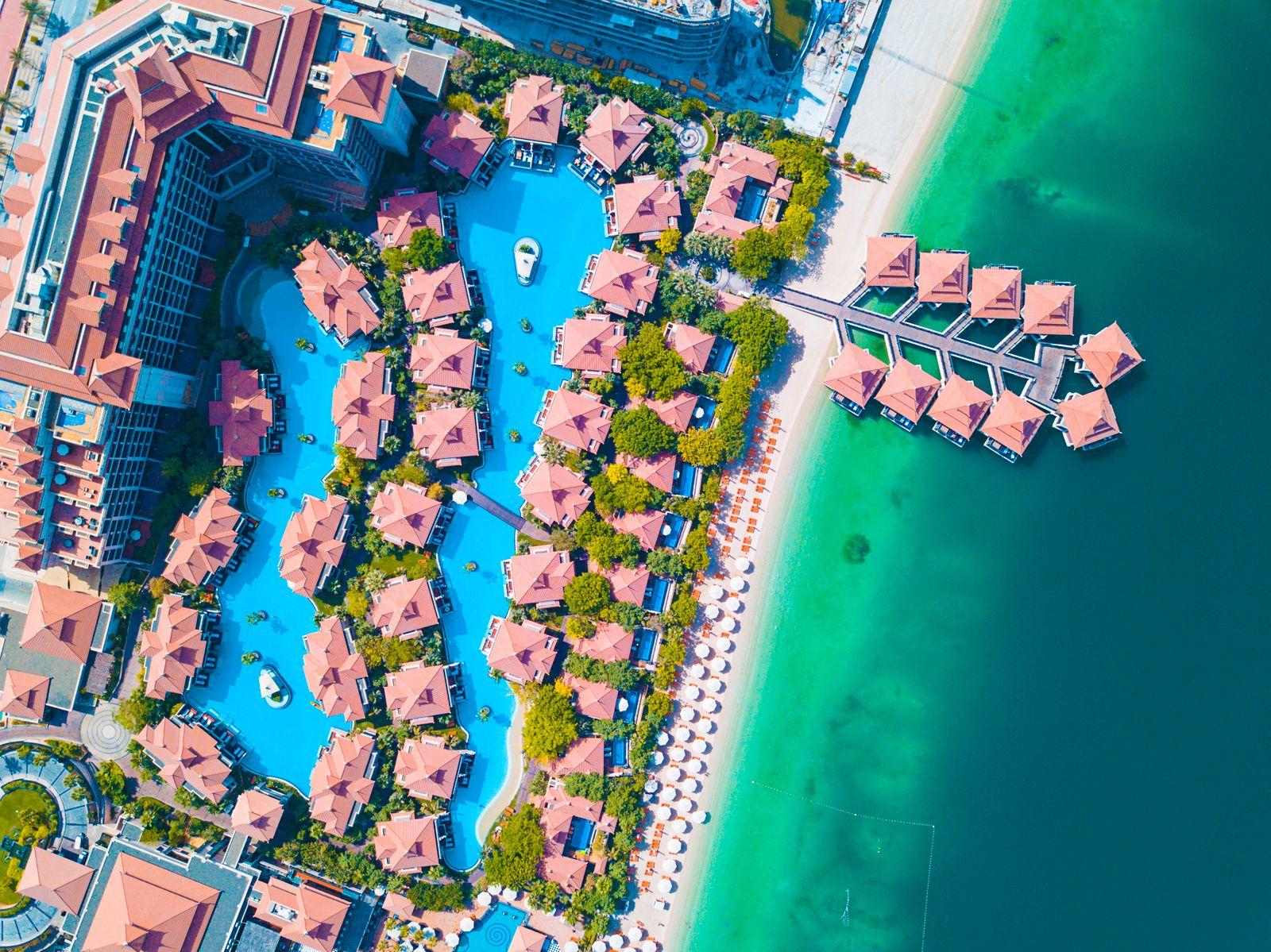 Aerial view of a tropical Caribbean shoreline and resort