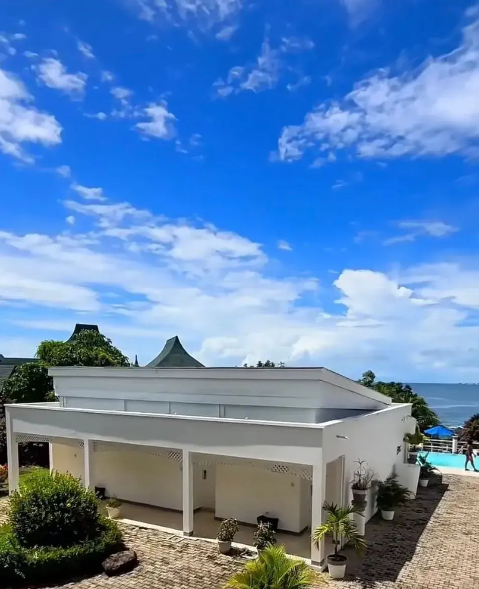 Poolside pavilion with the Caribbean Sea beyond