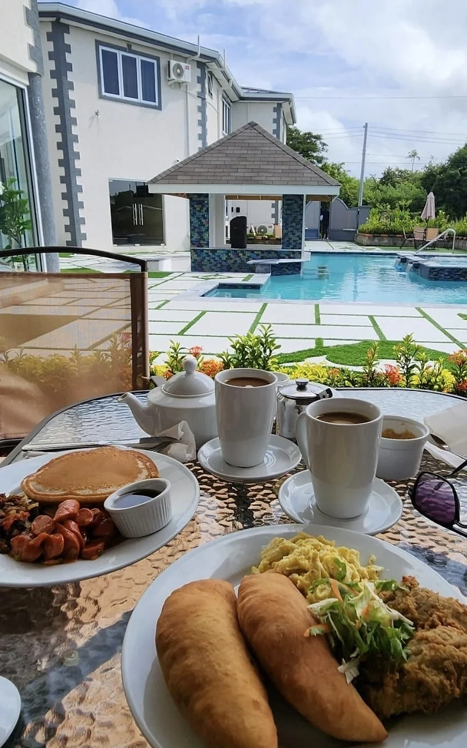 Tobago breakfast served beside the Escarlet Hotel pool