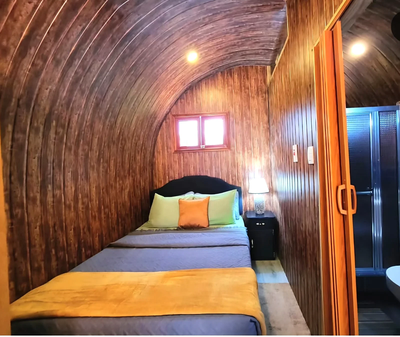 Comfortable bedroom inside the Glampedd pod