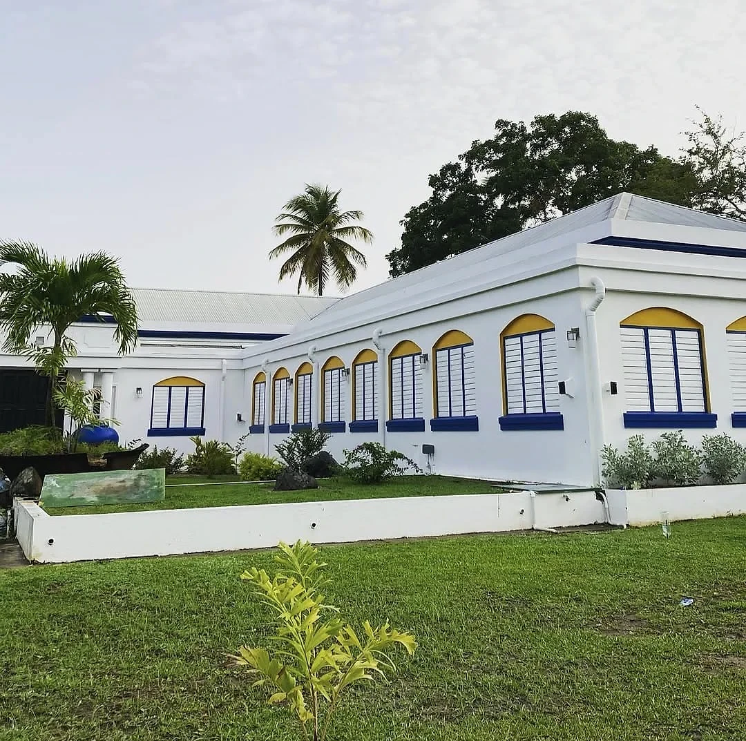 White Sapodilla Villa exterior and tropical lawn