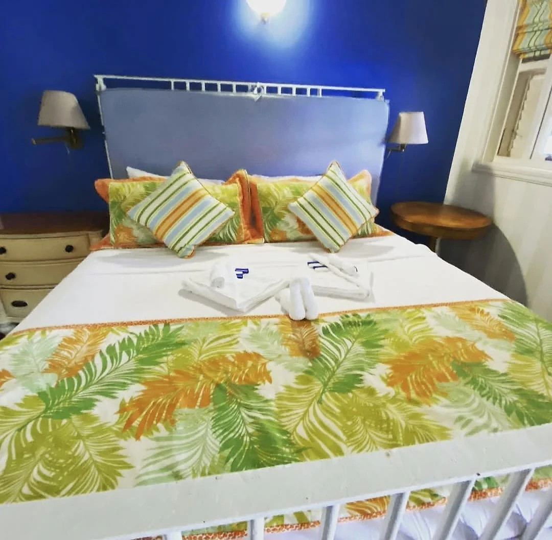 Bright guest bedroom at Sapodilla Villa